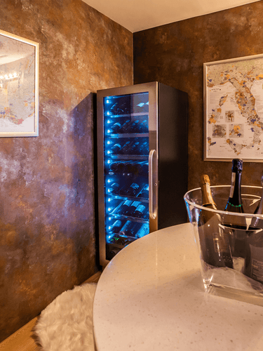 DV-568DSD Dual-Zone Wine Fridge displays in a private wine cellar